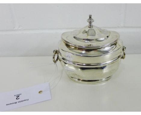 Victorian Scottish silver caddy of oval form with ring handles to side and domed finial to top, retailed by T. Smith & Sons, 