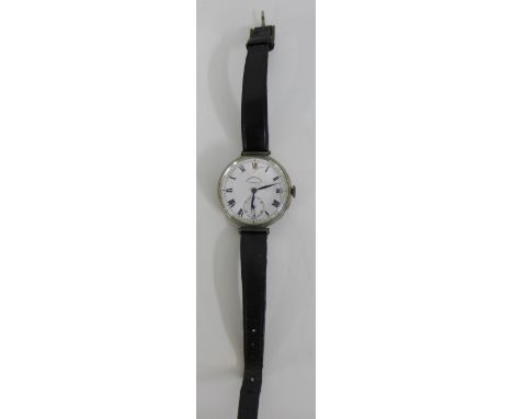 A 1930's silver cased Gent's wristwatch, the white enamel dial with Roman numerals and subsidiary seconds dial, with Fenton R