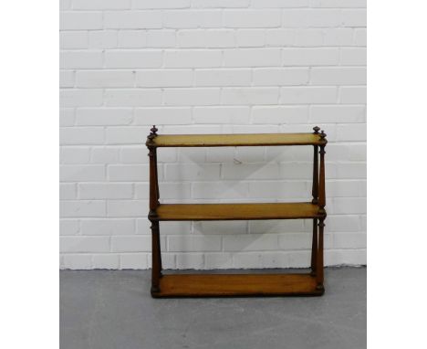 A mahogany three-tier wall shelf, 60 x 66cm 