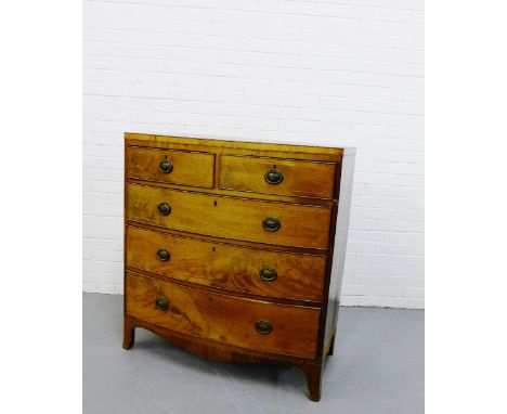 A 19th century mahogany and inlaid bow front chest with two short over three long graduated drawers on shaped apron with brac