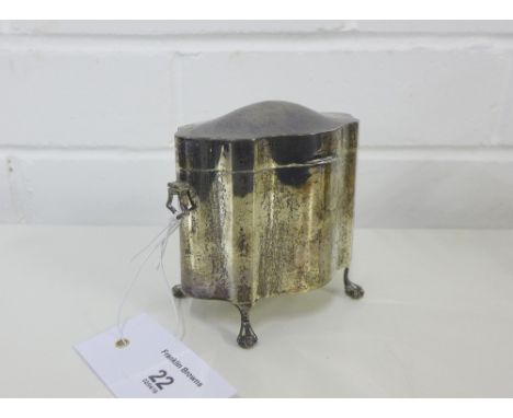 Edwardian silver tea caddy of oval fluted form, with hinged top and raised on four paw feet, likely by Blanckensee, Chester 1