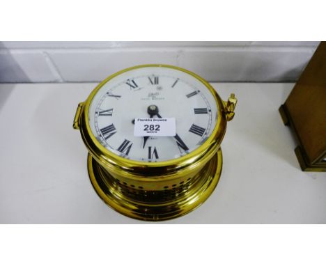 A Schatz brass cased Royal Mariner ship's clock, with enamel dial and Roman numerals, 16cm diameter 