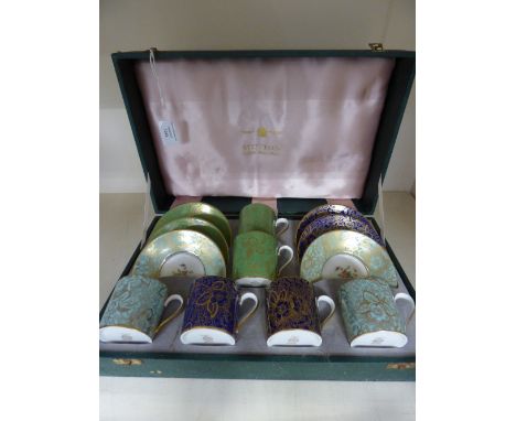 A cased set of six Minton Brocade coffee cans and saucers 