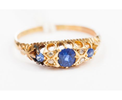 A Victorian sapphire and diamond ring on an 18ct gold band, size M