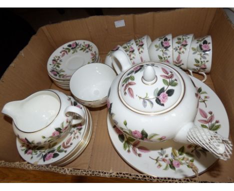 A Wedgwood 'Hathaway Rose' tea set, comprising tea pot, six cups, six saucers, six side plates, milk jug, sugar bowl and a ca