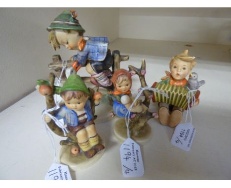 A collection of Goebel figures depicting children playing (4) 