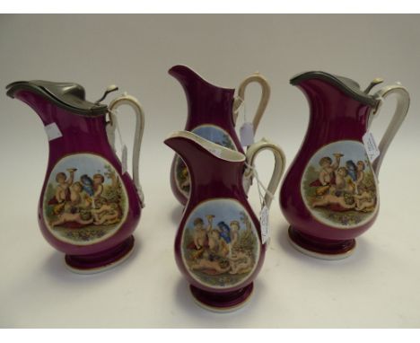 A graduated set of four Prattware jugs, maroon ground with Bacchus transfer printed ovals to each side (4)