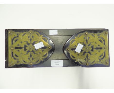 A mid Victorian book shelf (drawer) with pierced brass decoration, ebonised hardwood 