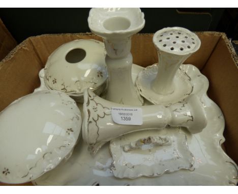 An Edwardian dressing table set, to include hat pin stand, two candlesticks, dishes, ring tray, etc and base 
