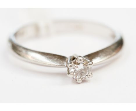 A platinum single stone diamond ring, round brilliant cut, ring size N