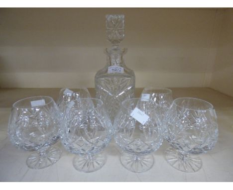 A cut glass brandy set including decanter and six glasses