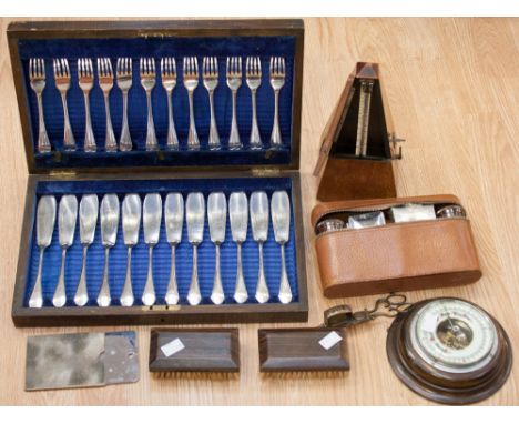 A quantity of treen - a Swiss metronome, barometer, boxed fish set, candle trimmer, etc 