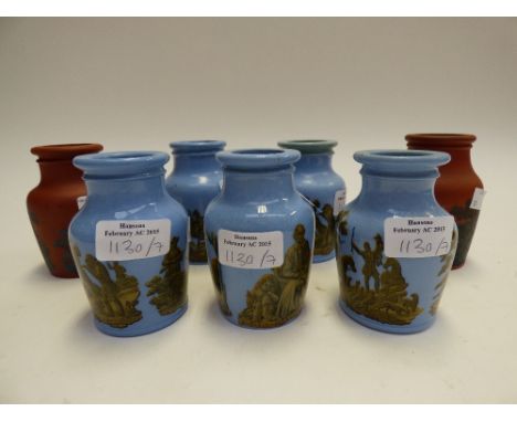 A collection of Prattware paste jars including blue and terracotta, decorated with transfer images including hunting scenes a