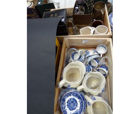 Blue and white cups, saucers, jugs, etc to include a travel iron, all in wooden crates (2) 