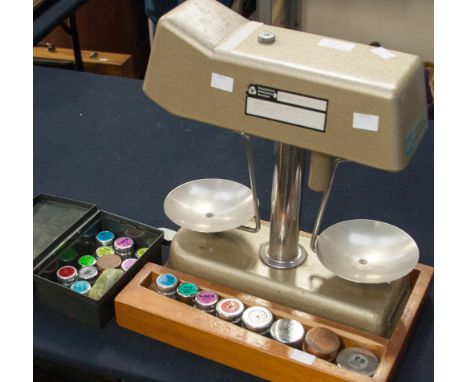 A set of weighing scales Omal Universal money character complete with weights and a box of further weights 