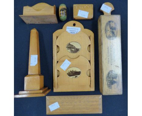 A Mauchline ware thermometer with view of Inverary Castle, together with a book rest, a miniature card stand with vignette Ma