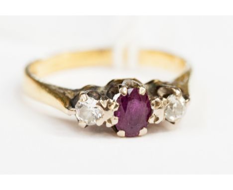 An 18ct gold ruby and diamond ring 