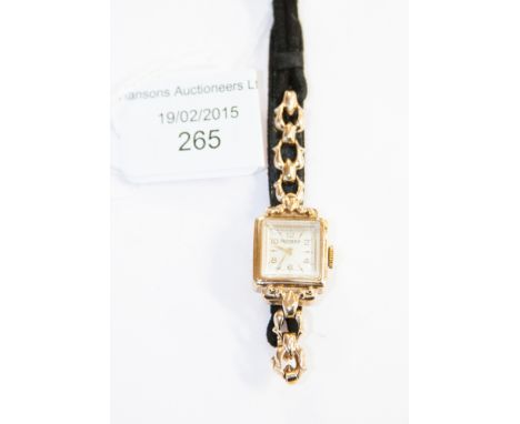 A 9ct gold ladies 1950s bracelet watch .790 fifteen jewels with Rotary emblems, strap links rolled gold 