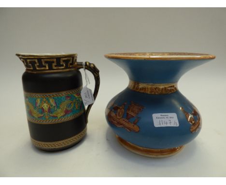 A Prattware spittoon transfer printed with Grecian vase decoration on blue ground, together with a black ground jug with poly