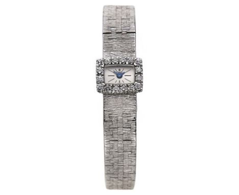 Kl. Damenarmbanduhr Piaget, Schweiz 1967.18 kt WG. Handaufzug. Ref.-Nr. 1304A6. Serien- Nr. 11899. Werk-Nr. Piaget 660012. Ge