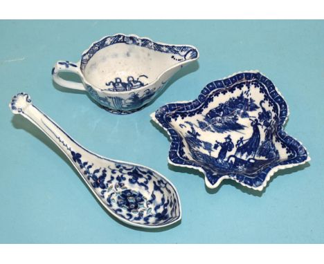 A Worcester pierced spoon, 13.5cm, a Caughley pickle dish, 2.5cm high, 11.5 x 10.5cm and a Derby blue and white cream boat, 5