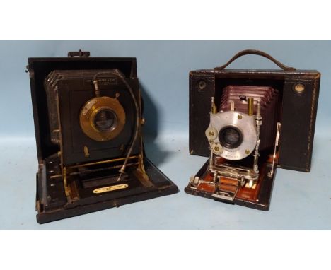 A Lancaster Royal Instantograph half-plate camera, (back missing, a/f) and a Kodak half-plate camera with CP Goerz aluminium 