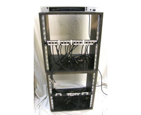 Two custom made wooden framed studio rack units, each with a single rack patch bay; together with a Korg DTR- two digital tun