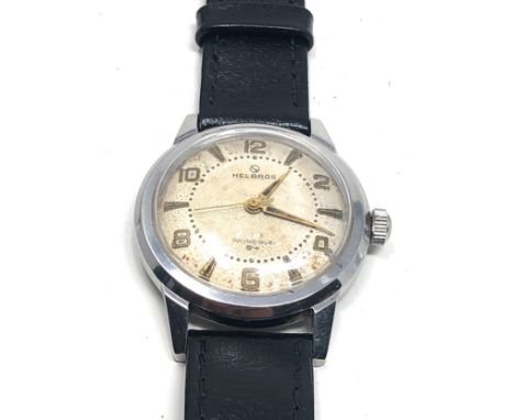 Vintage stainless steel Helbros invincible gents wristwatch the watch is ticking 