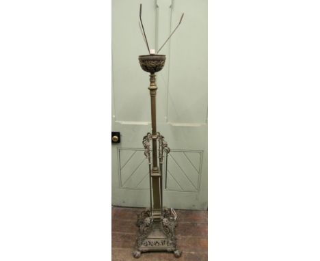 A good quality Victorian cast brass telescopic oil lamp stand raised on a square base with cast and pierced detail, further f