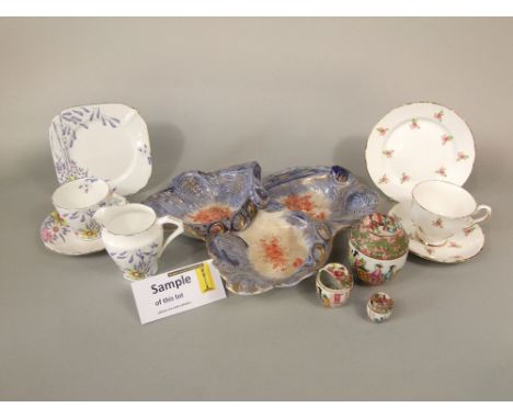 A collection of art deco tea wares with floral detail comprising milk jug, ten tea cups, twelve saucers and ten tea plates, t