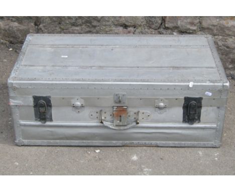 A stainless steel travel trunk