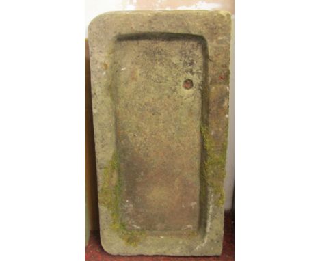 A shallow limestone trough or sink, 22cm x 47cm