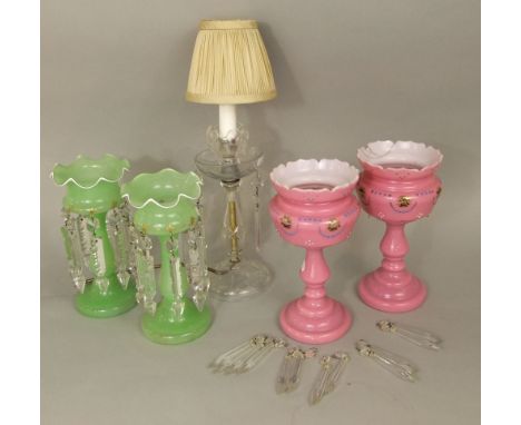 Two pairs of opaline glass lustres, one in pink, the other in green, together with a further lustre table lamp (5)