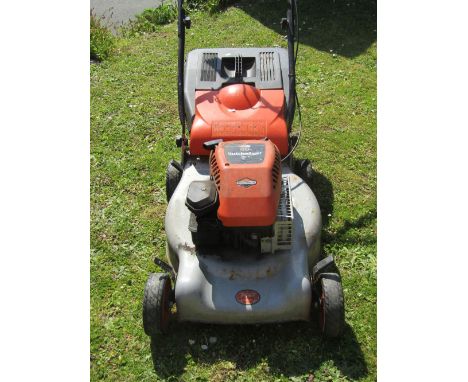 A Flymo Quicksilver 46S petrol driven rotary lawn mower with Briggs &amp; Stratton engine