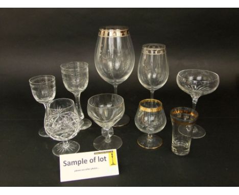 A large collection of mainly cut glassware to include tumblers, goblets, etc; together with perspex stands, a small quantity 