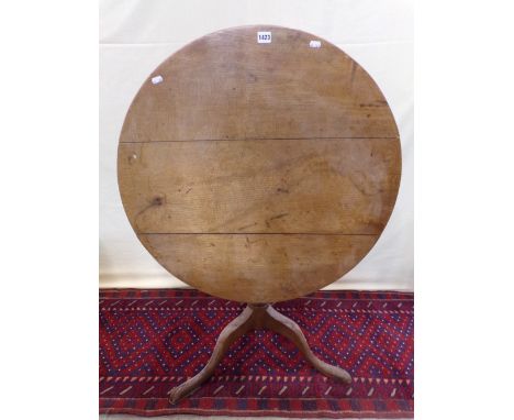 A 19th century pale oak snap top occasional table on turned pillar and tripod