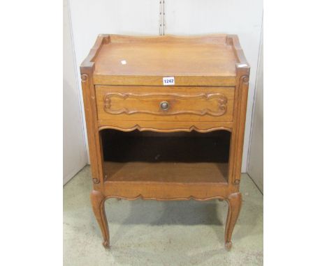 Small oak  lamp table with frieze drawer and open centre with carved detail, a further nest of three graduated occasional tab