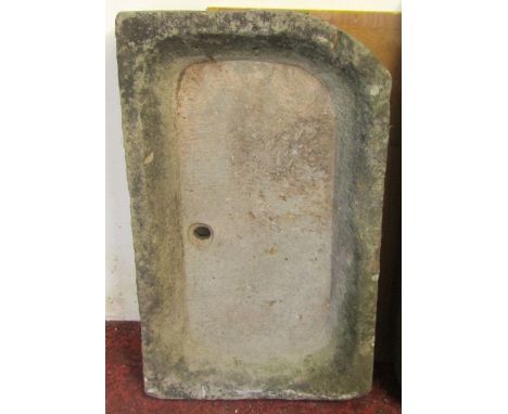 A shallow limestone trough or sink with drainage holes, 83cm x 50cm