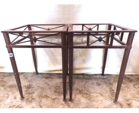 A pair of good quality occasional/lamp tables, the iron frames with square vacant tops, ring tied x framed panels, tapered le