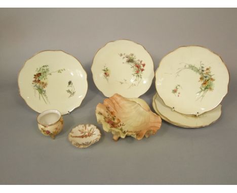 A Grainger Worcester blush ivory shell shaped dish with floral detail, printed numbers to base 146, together with further Roy