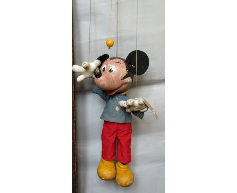 A large 1950's shop display Mickey Mouse Pelham puppet, wood construction with felt ears, jacket and red cotton trousers. 24'