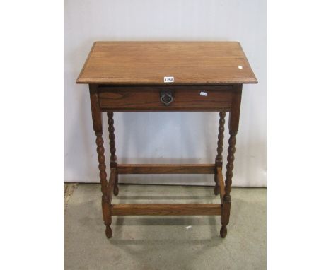 An old English oak style credence table with frieze drawer on turned supports and a further oak table on bobbin supports (2)