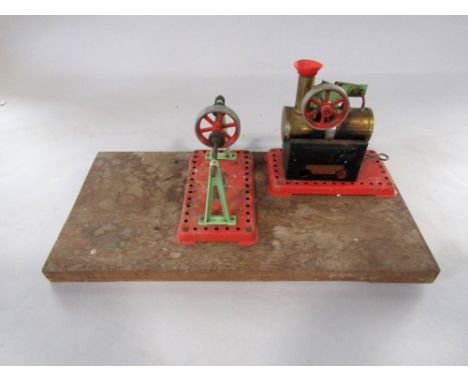 Mamod stationary steam engine with spirit burner, together with raised axle, both mounted on wooden plinth