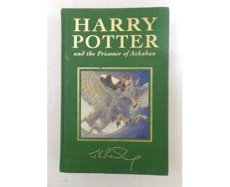Harry Potter and the Prisoner of Azkaban by J K Rowling, a deluxe first edition with green cloth cover, picture decoration an