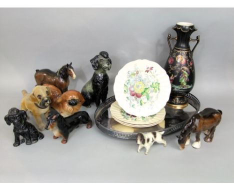 Two Beswick models of standing shire horses, a Trentham model of a pekinese dog, a further ceramic dog, a vintage flock cover