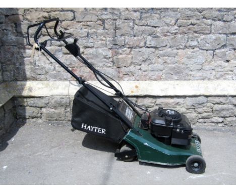 A Hayter Quantum XM35 petrol battery rechargeable rotary lawn mower with roller and grass collection box/bag