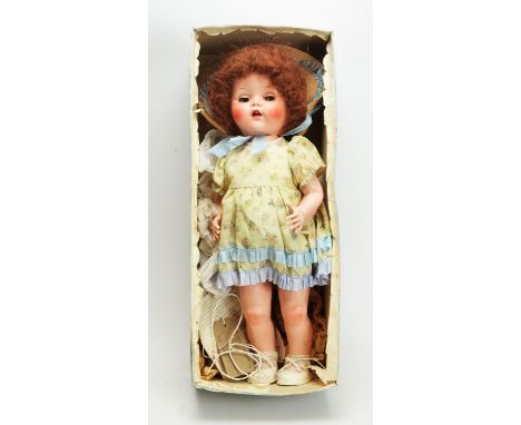 Pedigree by IMA Ltd., Merton, England: a composition "Delite" Walking Doll, 20SW/7, size 20in., from 1952, with blue glass ey