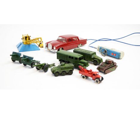 A Dinky No. 677 Armoured Command vehicle; a Dinky No. 689 Medium Artillery tractor; a Dinky No. 752 Goods Yard crane; a Dinky