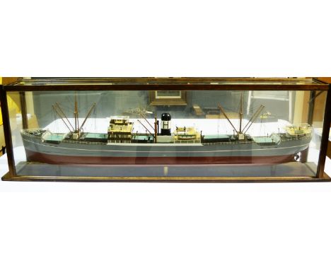 A large scale model of the SS Harcalo steamboat cargo ship, in glazed and stained wood case, 145 x 23 x 45cms high.