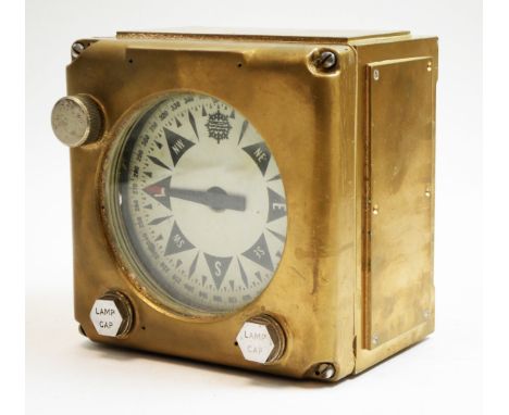 A brass cased compass, the dial marked 'DECCA, COPENHAGEN, AAHAS', fitted two hexagonal knobs engraved 'Lamp Cap', also with 